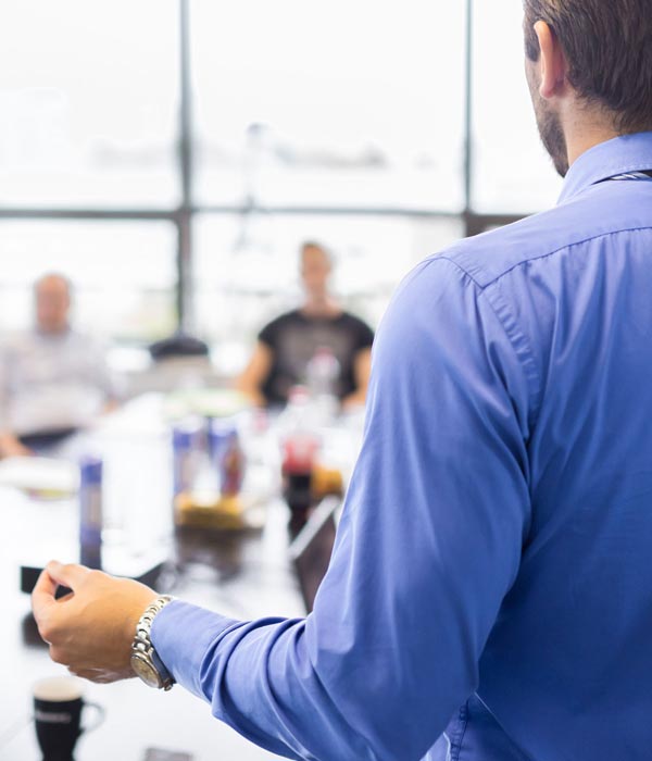 person talking to group
